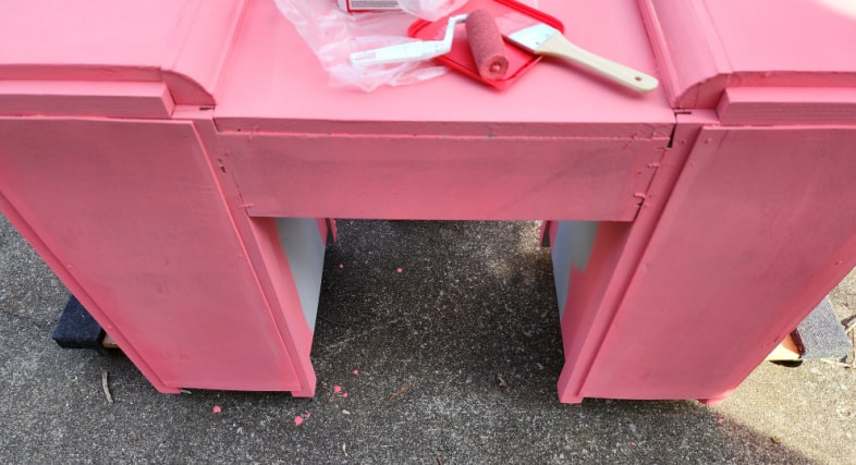 back of art deco vanity painted bright pink