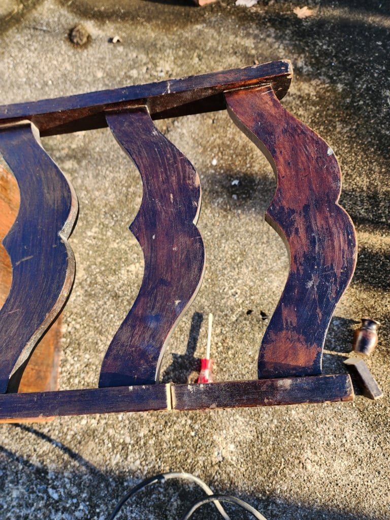 removing the top section of the back of the chair leaving two rungs instead of three