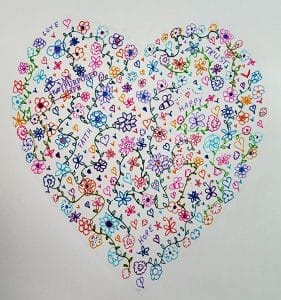 doodle heart with flowers and inspirational words