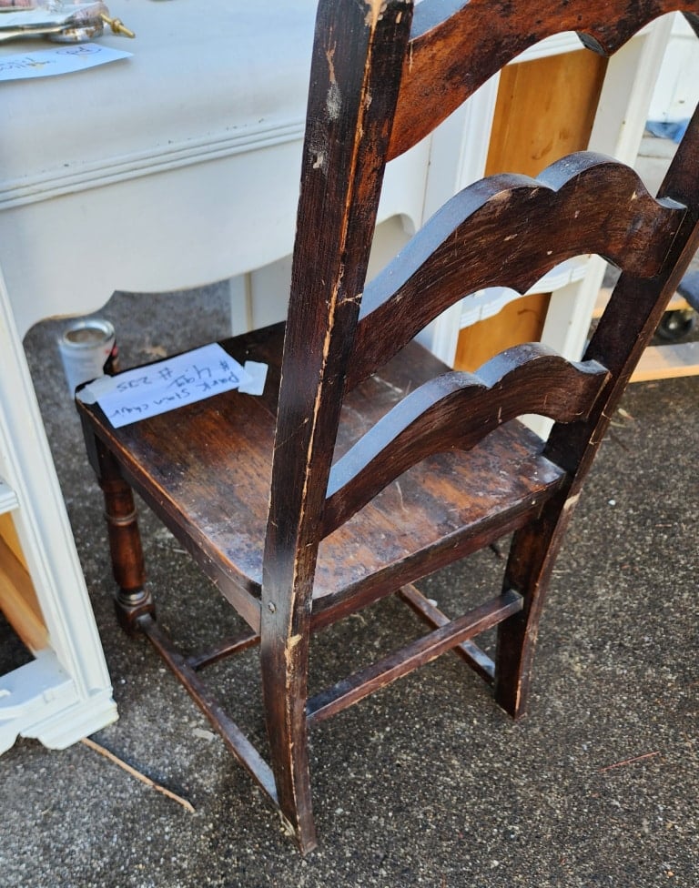 shorter chair in the kneehole of the desk