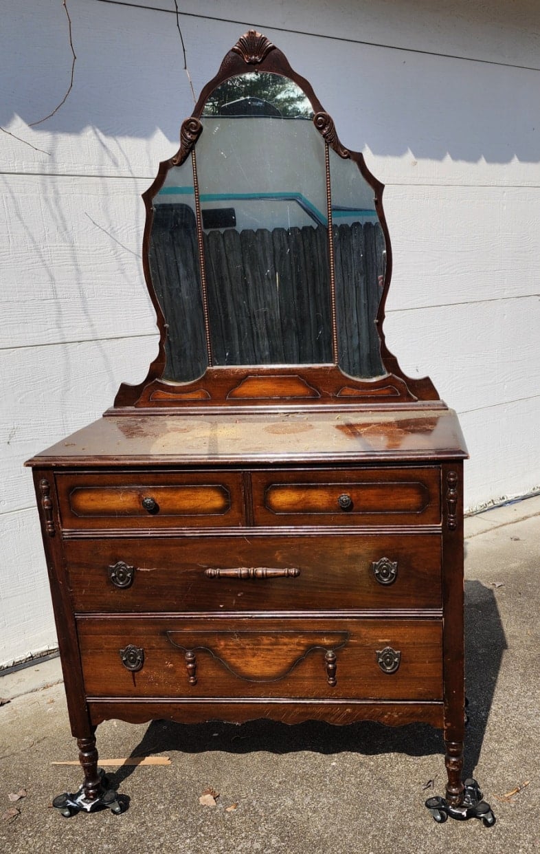 antique dresser with triple mirror in its original state