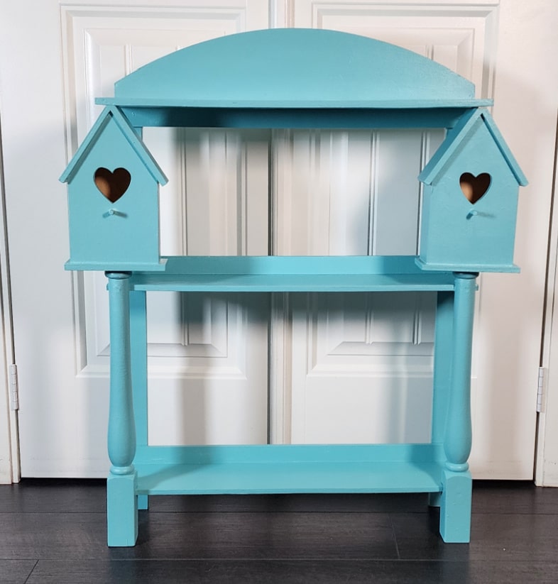 small aqua shelf with two faux birdhouses