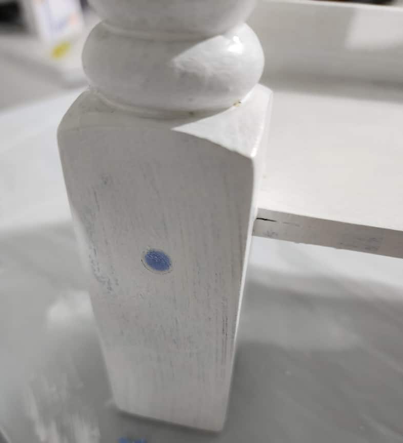 screw hole with blue spackle