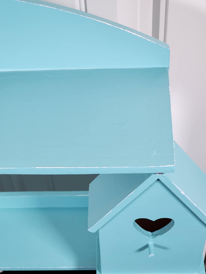 blue country shelf with white paint distressing