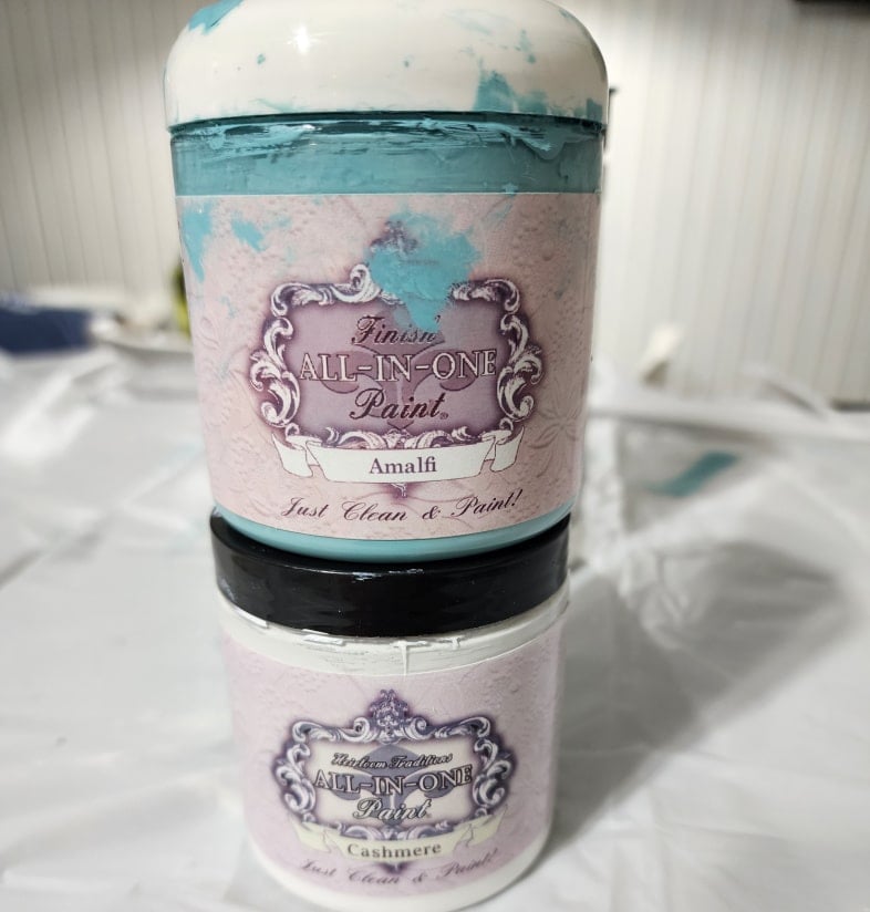 paint containers stacked, almafi (aqua) and cashmere (white)