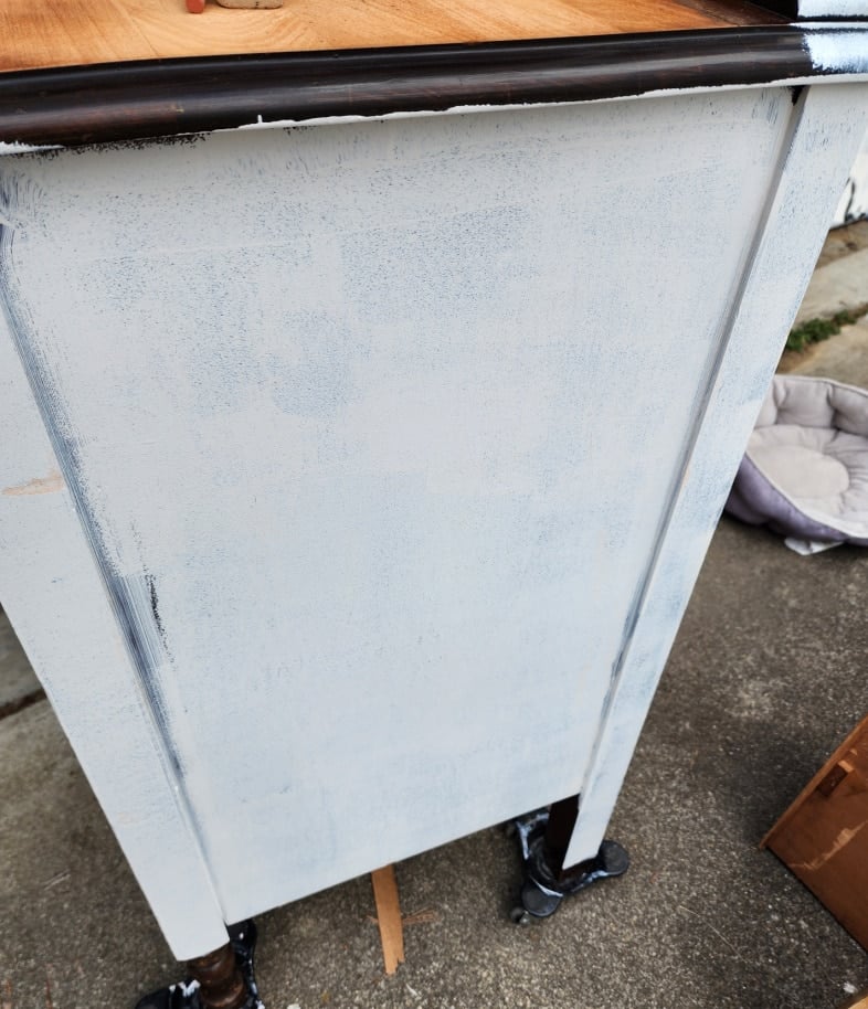 gray painted side of dresser