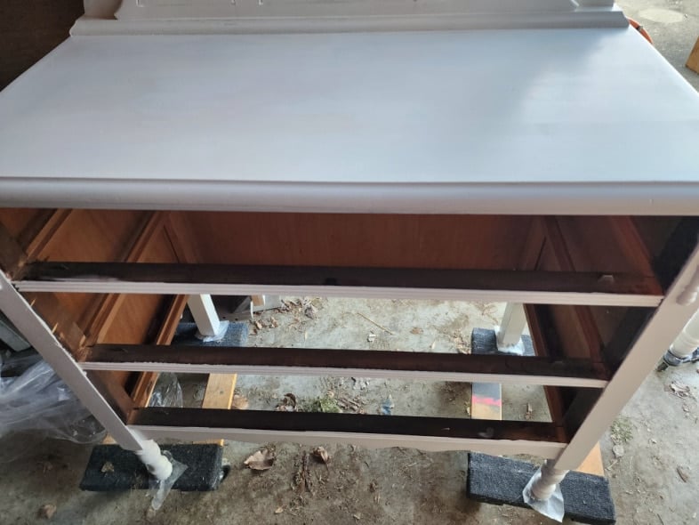 tannins bleed through paint on antique dresser top