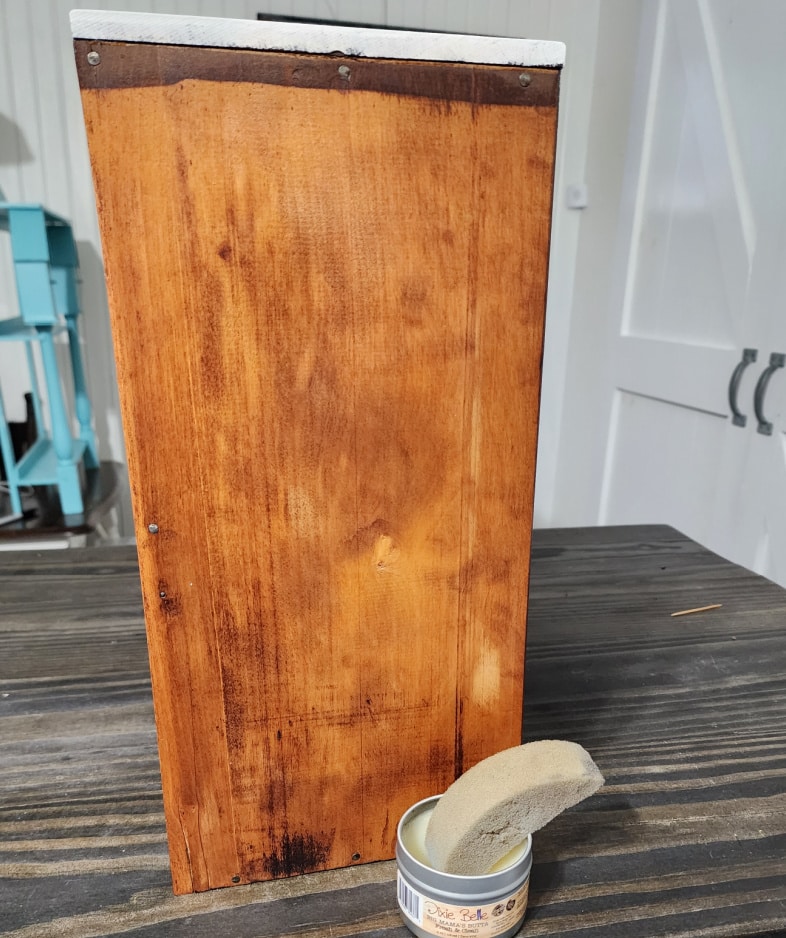 Drawer side and a sponge in a jar of wax