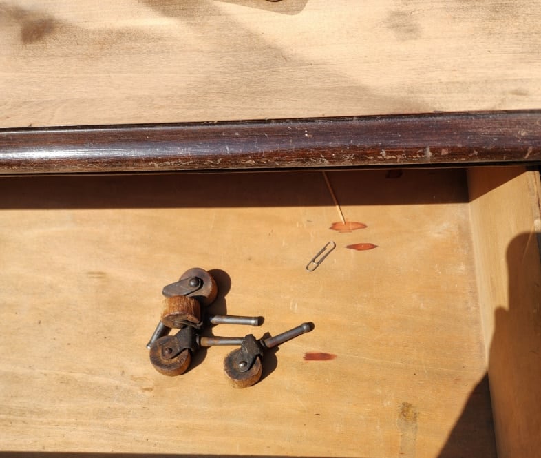 antique dresser wheels in the drawer