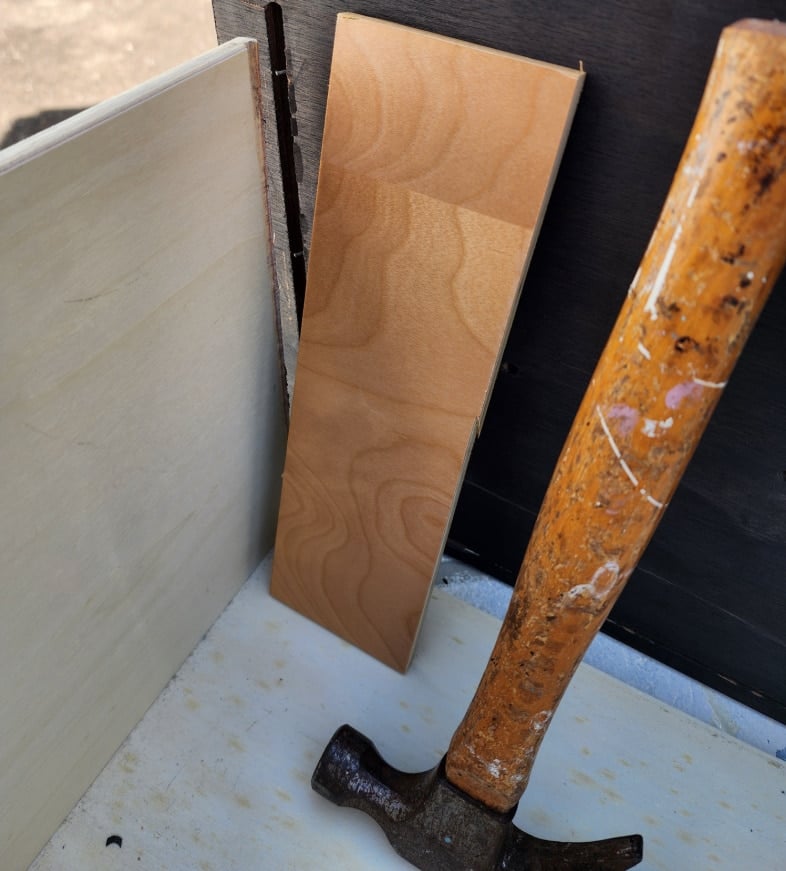 dismantle drawers with a hammer and scrap board