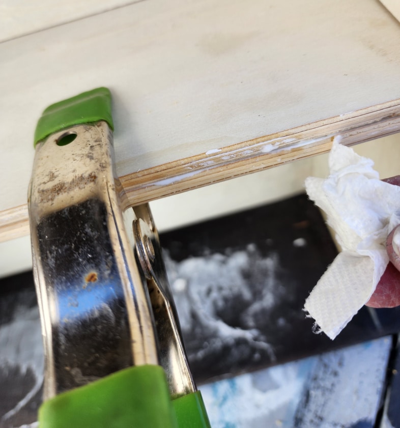 clamp holding drawers together wood glue oozing out