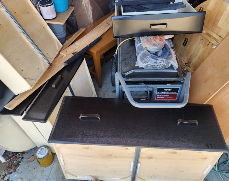 drawers in messy garage