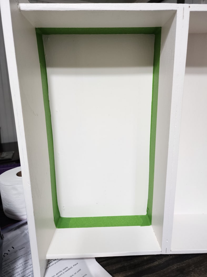 green painter's tape on drawer sides