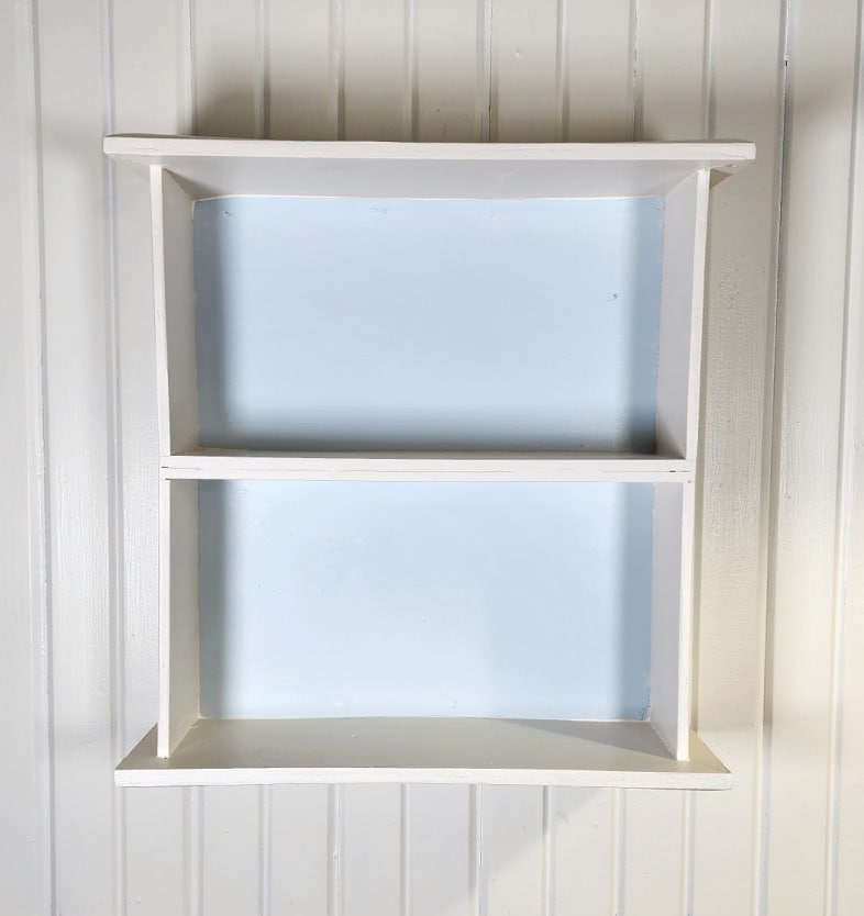 white upcycled drawer shelf with light blue back
