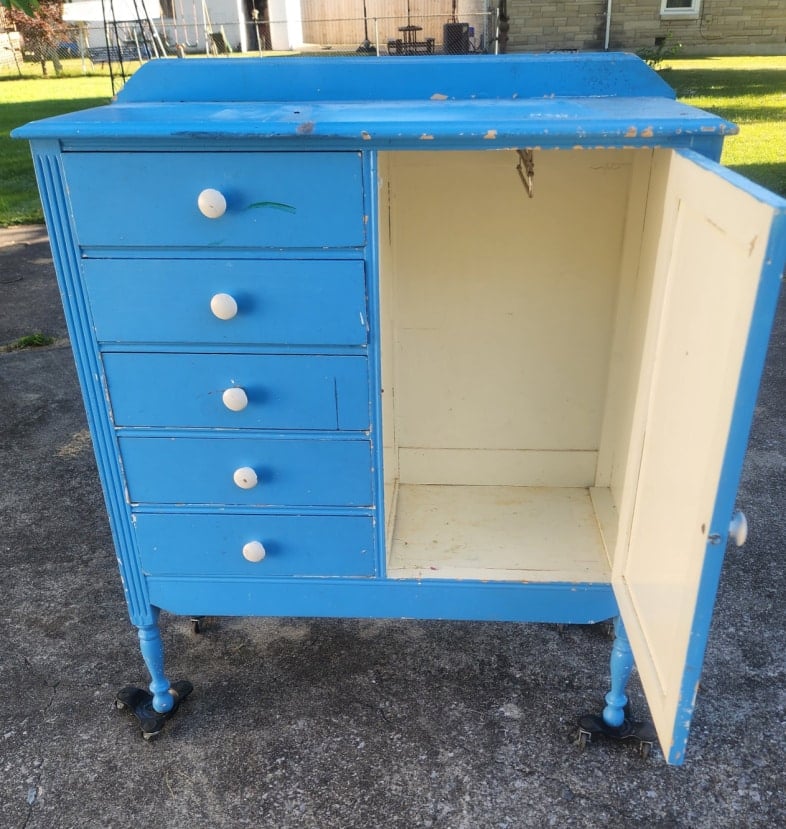 blue wardrobe with door open