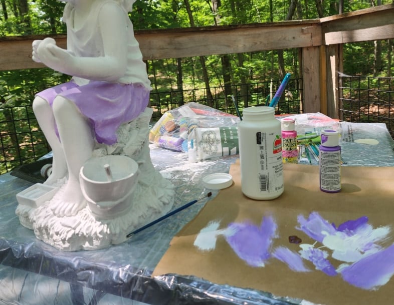 lavender paint used o the little girl's skirt