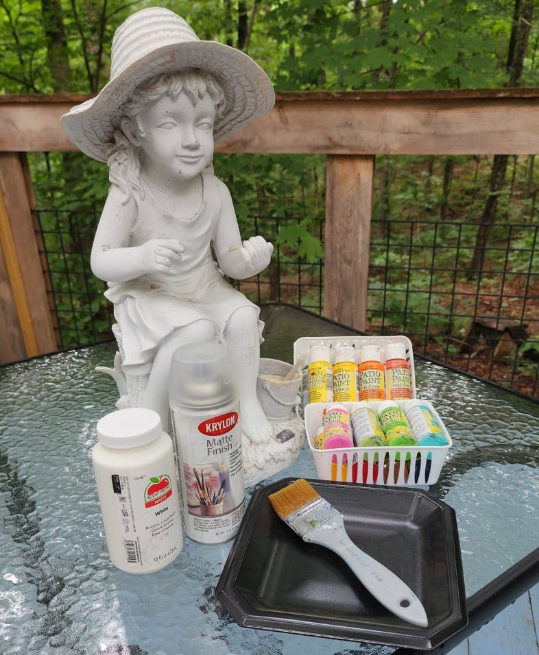 paints used to paint a little girl garden statue including a spray sealer
