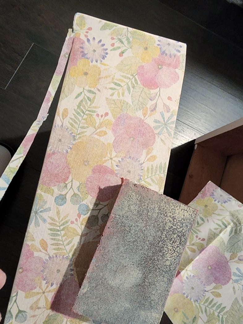 sanding block on decoupage tissue paper
