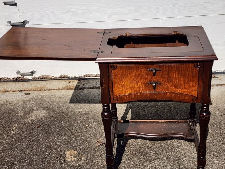 upcycled sewing cabinet with the lid open