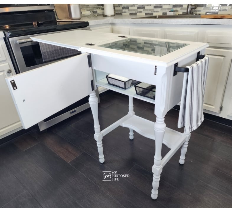 front view of sewing cabinet food prep station with lid and door open