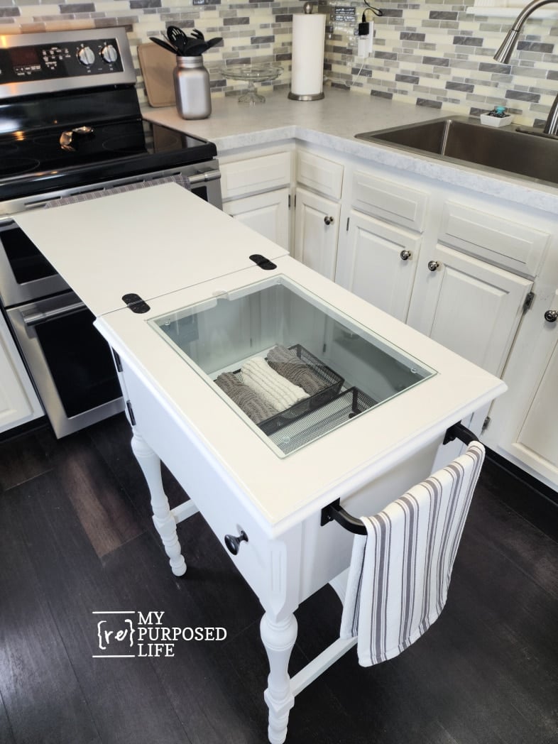 sewing cabinet kitchen island with the top open
