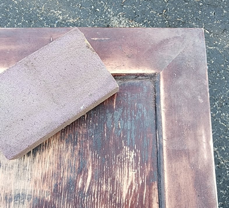using a sanding sponge for the corners of the tabletop inset