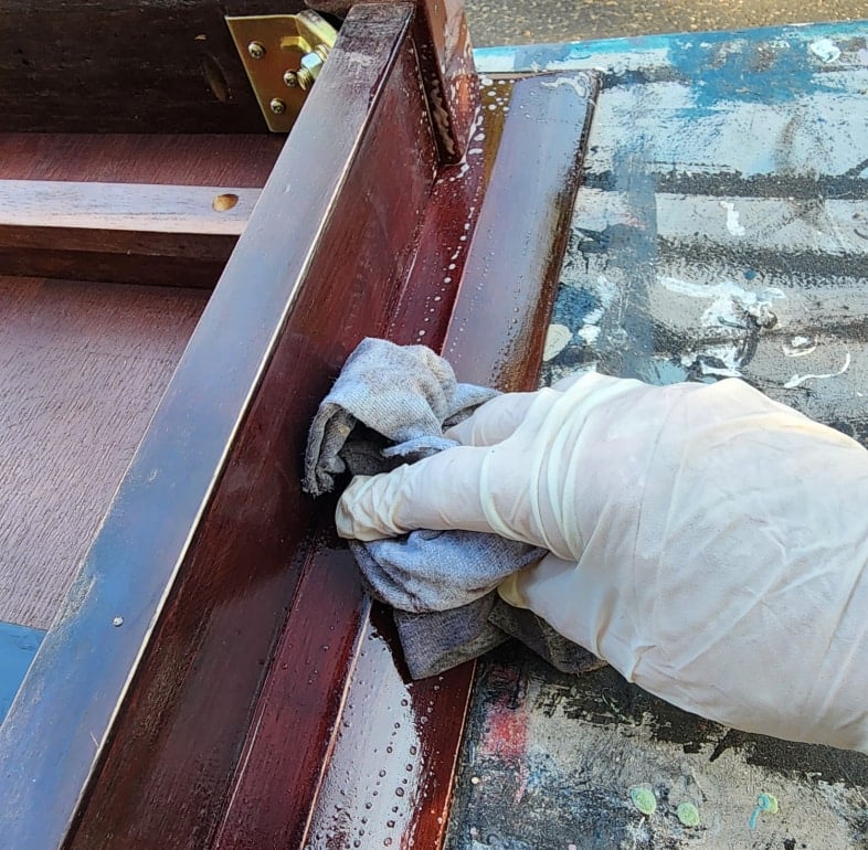 wiping off the skirt of the table