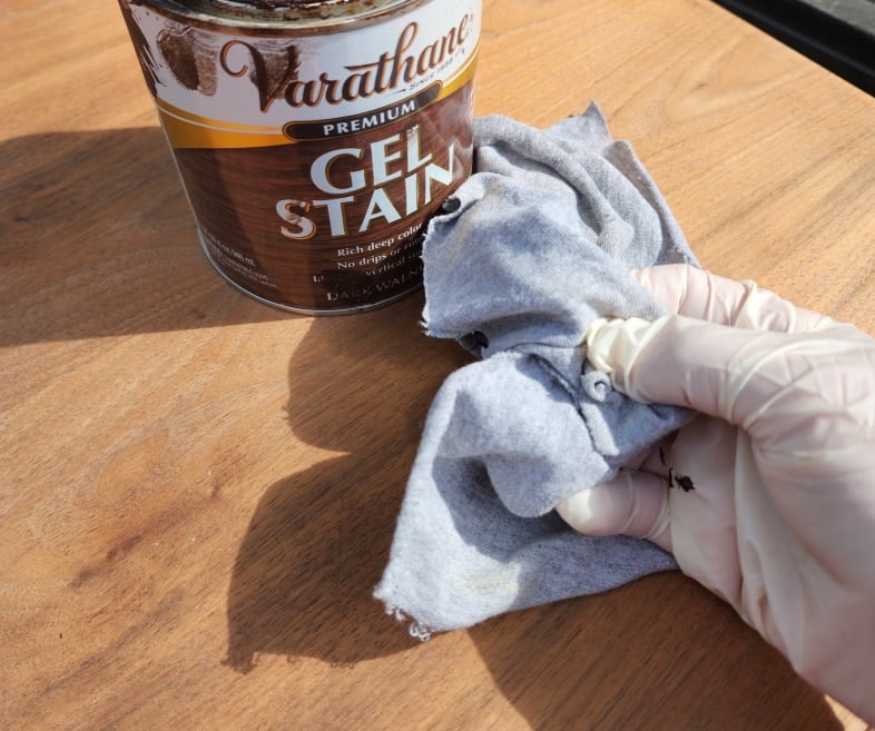 applying gel stain with a cloth