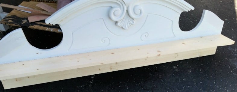 extra wood added to a pediment to make a shelf