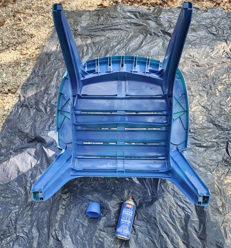 spray paint underside of plastic adirondack chair blue