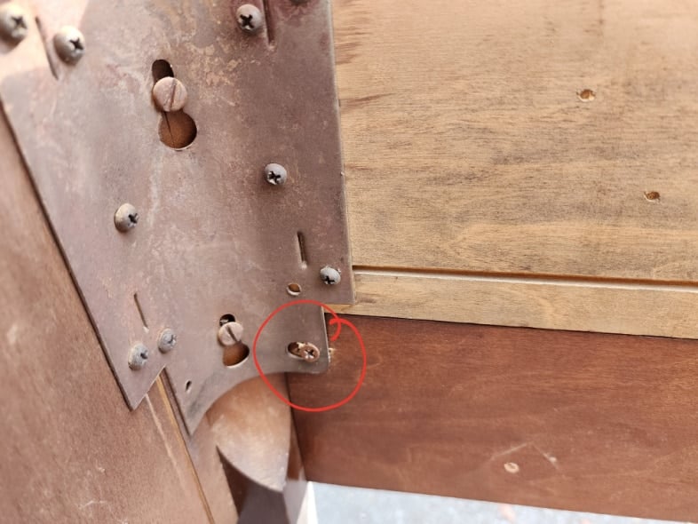 tighten screw so door no longer opens