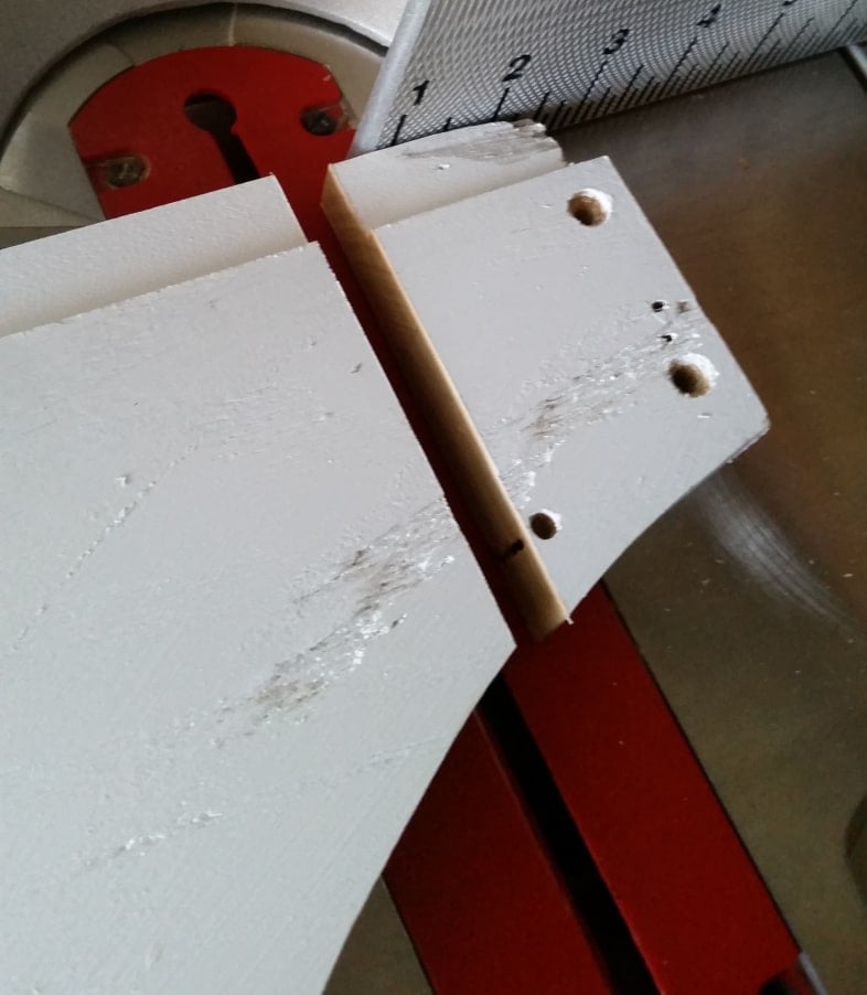 trim off sides of pediment with miter saw