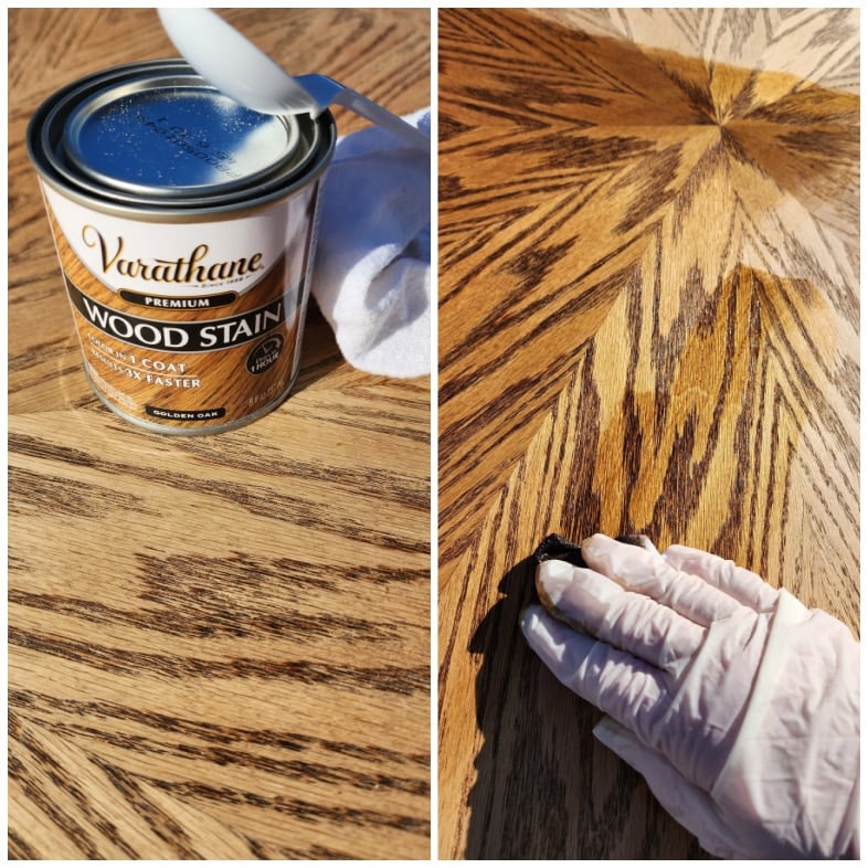 applying golden oak stain with a cloth while wearing gloves