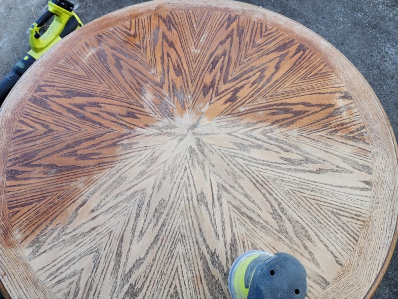finish removed on half of the kitchen table