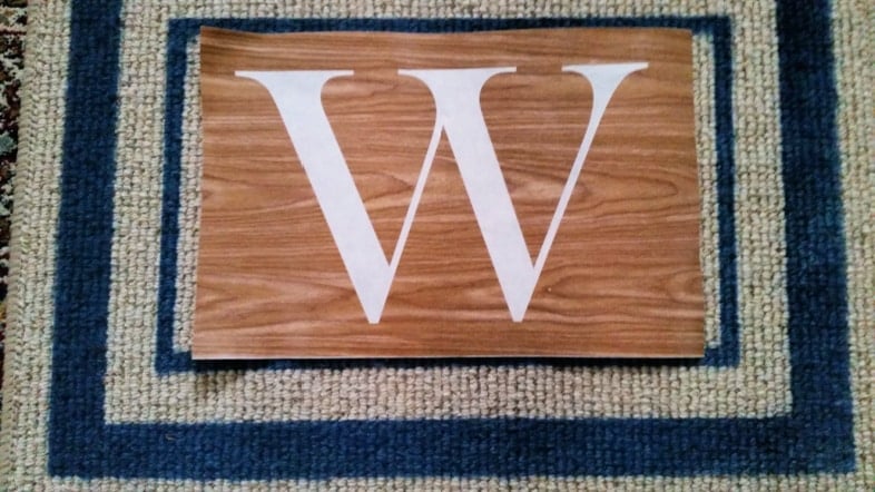 fitting monogram to welcome mat