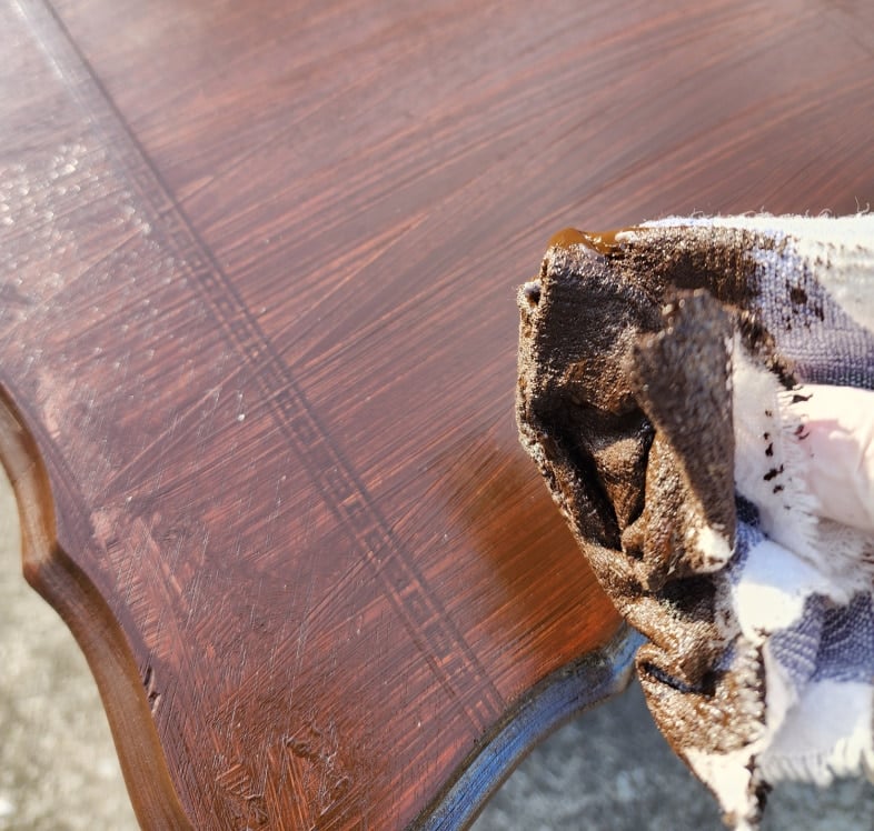 applying gel stain with a cloth