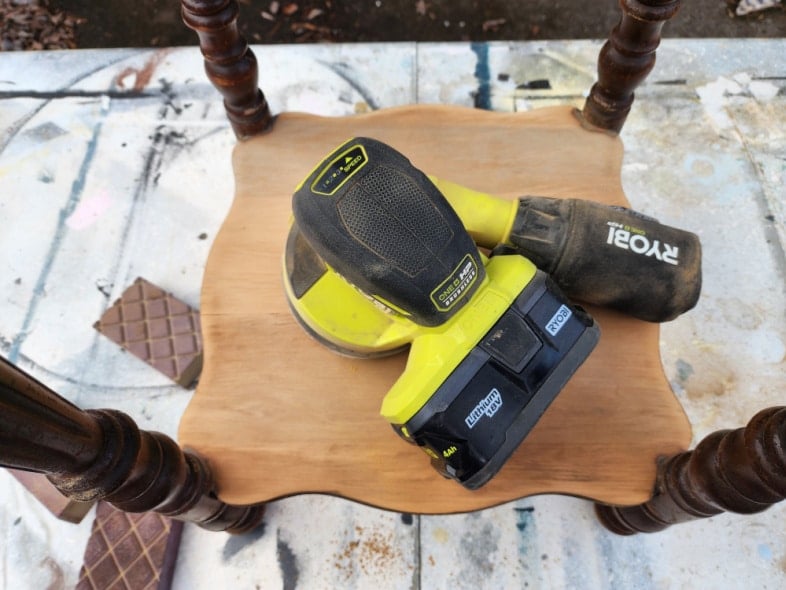 orbital sander reveals pretty lower shelf