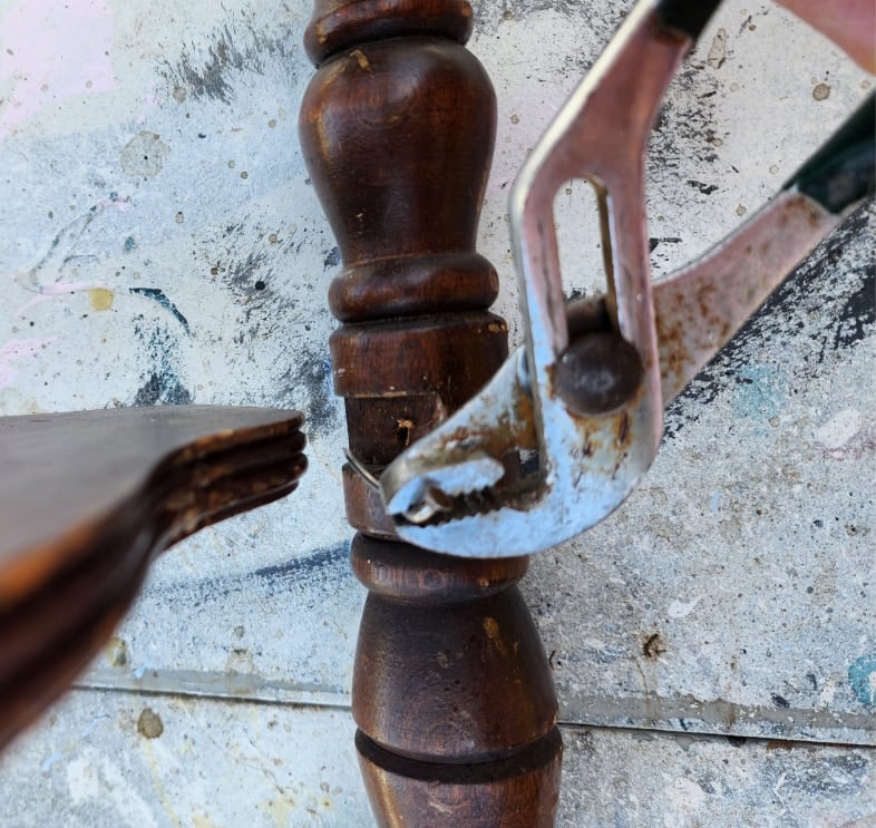 repair thrift store table-removing old nail
