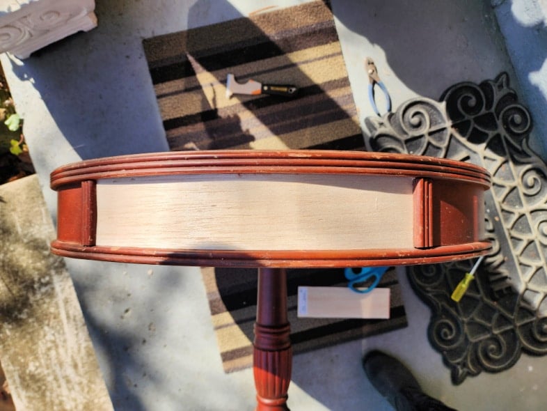 balsa wood replaces missing drawer on drum table