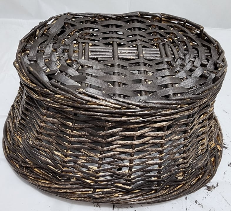 painting second coat on wicker basket