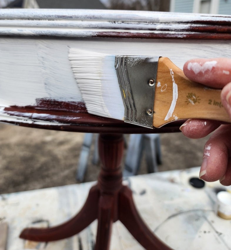 priming with a paint brush