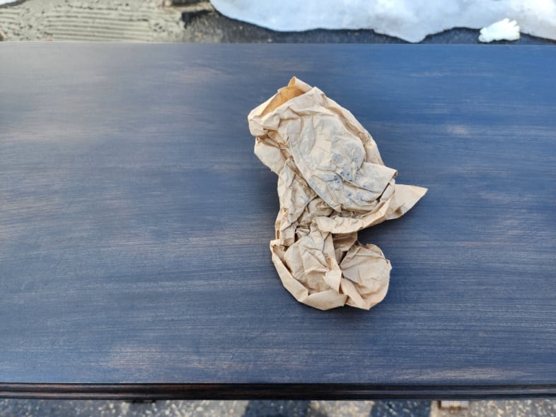 sand with brown paper until table top is smooth