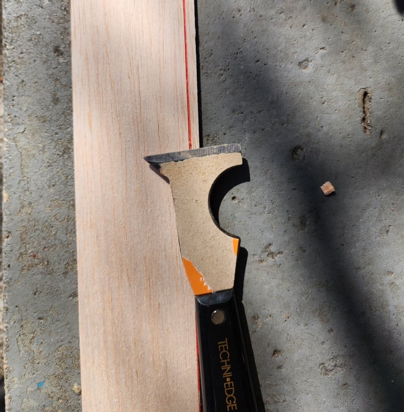 score basla wood to trim to size