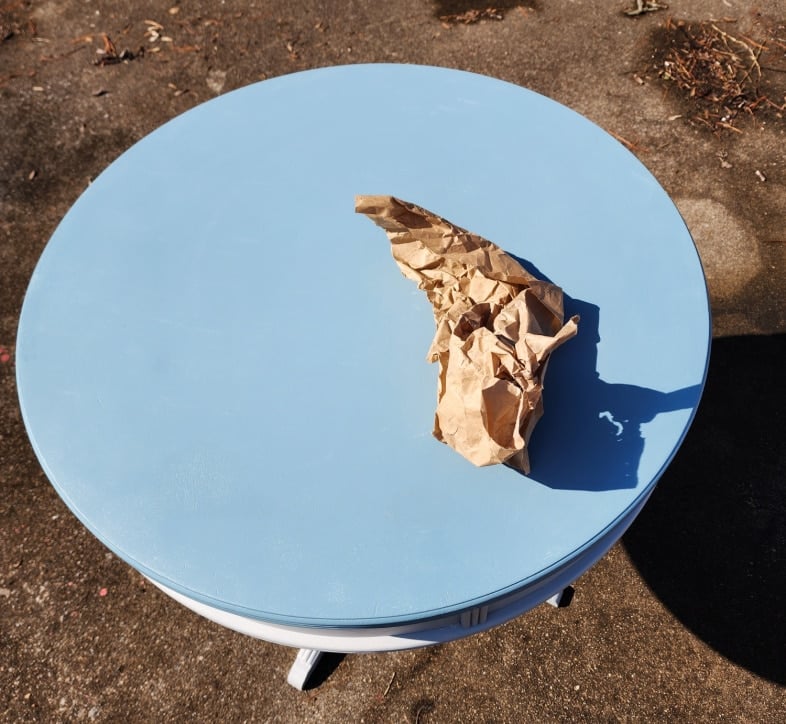 using brown craft paper for sanding between coats