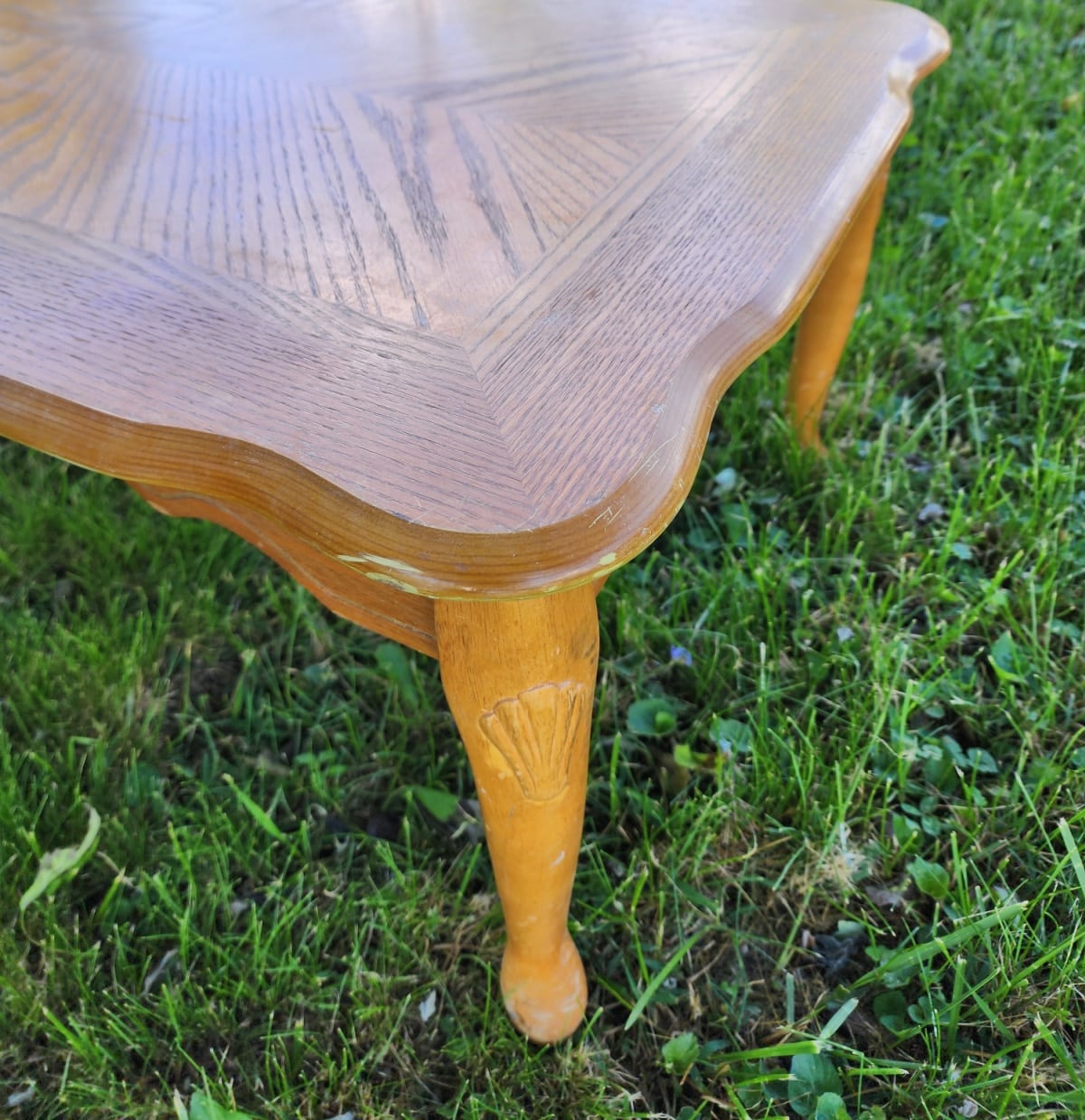 carved shell detail on the legs