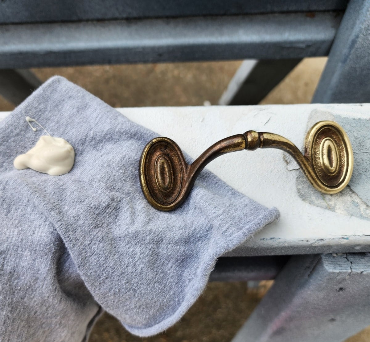 apply brasso with a soft cloth