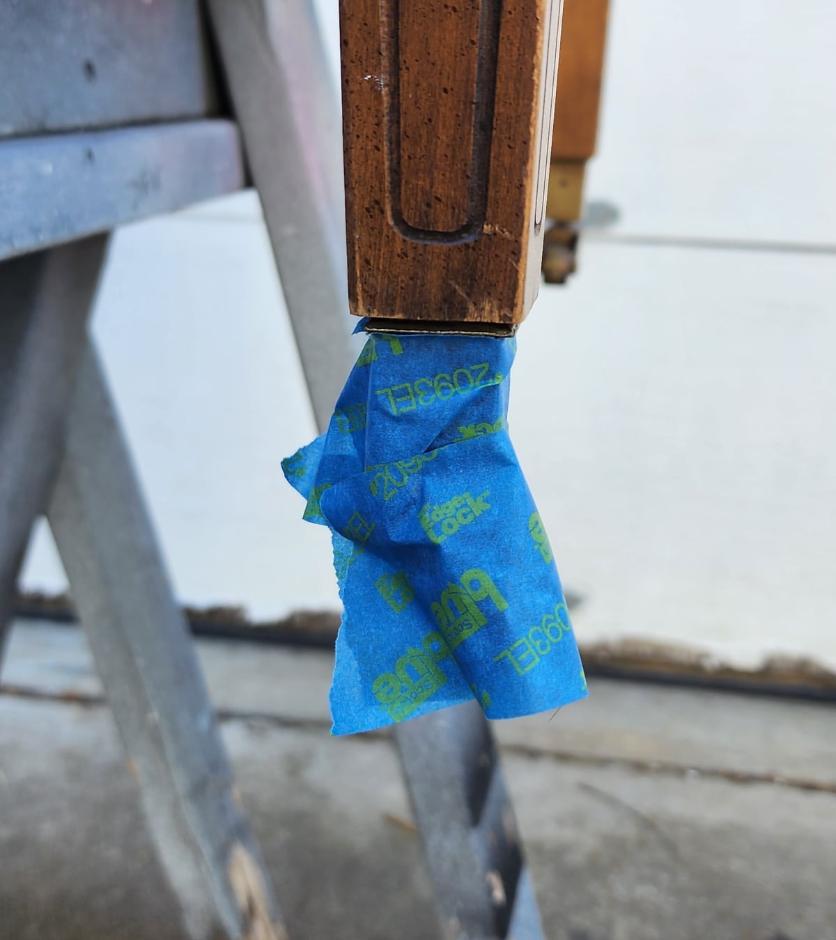 apply painter's tape to protect casters