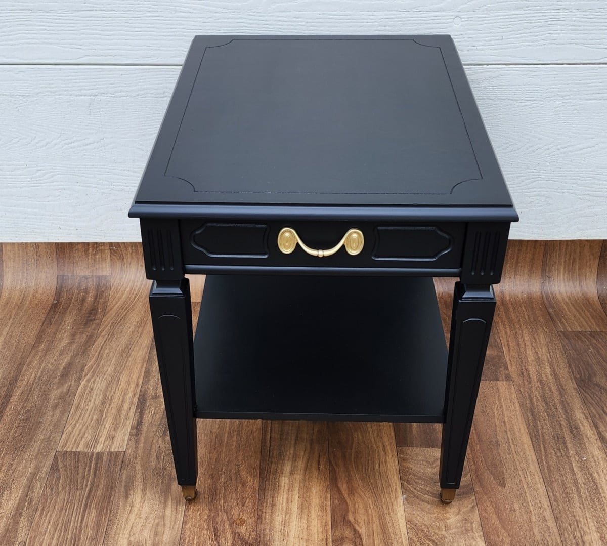 newly painted mintage end table with a brass handle