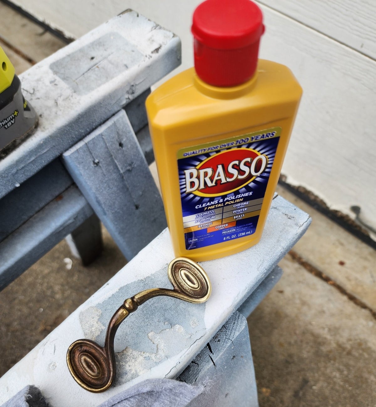 ready to apply brasso on drawer handle