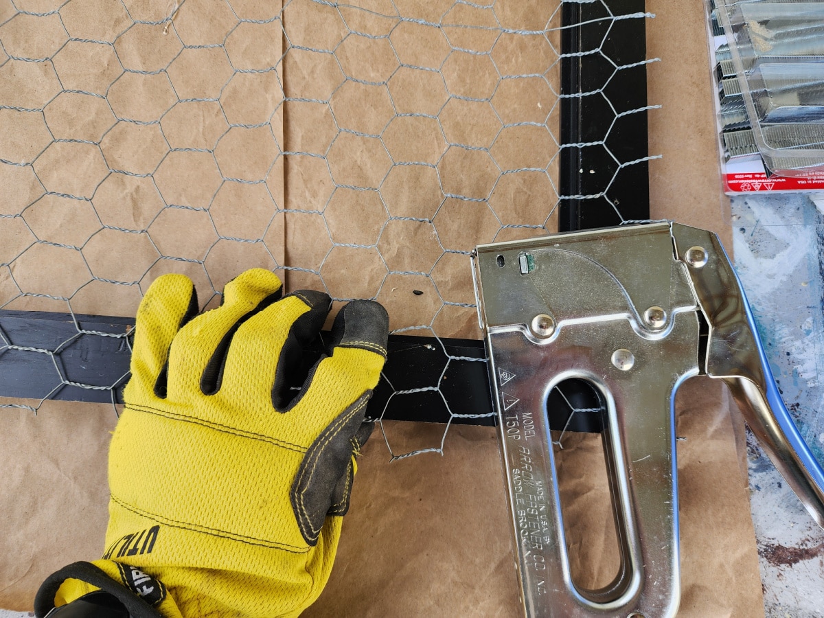 secure chicken wire to back of wooden picture frame